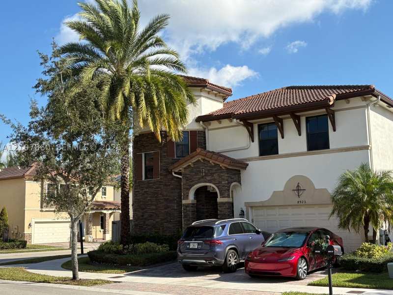 5 bedroom SingleFamilyResidence at 8925 NW 99th Ct, Doral Breeze, Doral — photo 1