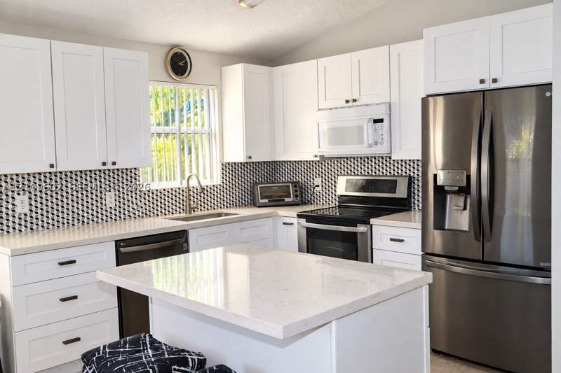 3 bedroom SingleFamilyResidence at 12973 SW 245th Ter, Jordan Commons, Homestead — photo 2