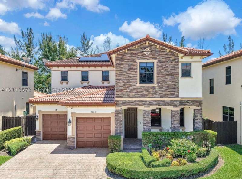 4 bedroom SingleFamilyResidence at 9860 NW 86th Ter, Doral Breeze, Doral — photo 1