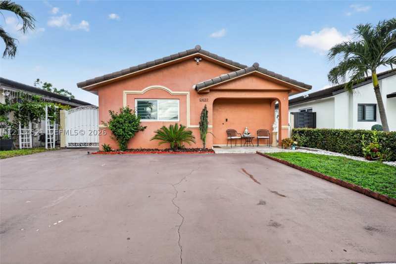 3 bedroom SingleFamilyResidence at 2427 W 70th Pl, Robles Gardens 3rd Addn, Hialeah — photo 1