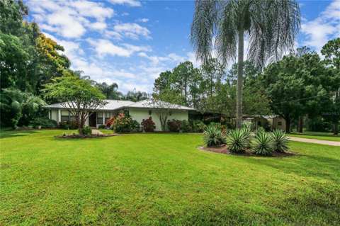 6168 Arborea Drive, home for sale in Indian Lake Estates 33855