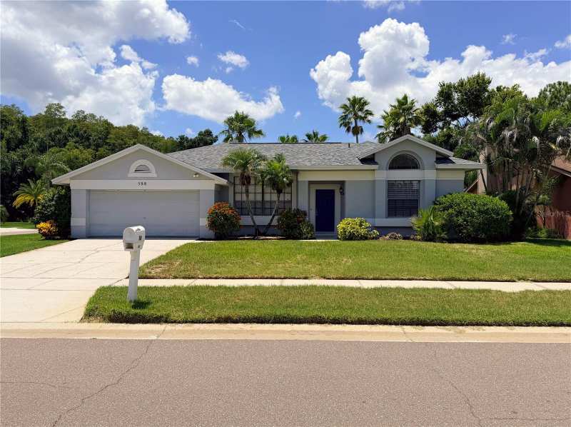 4 bedroom Single Family Residence at 588 Hollowtree Place, Oaklake Village At Woodfield Ph II, Tarpon Springs — photo 1