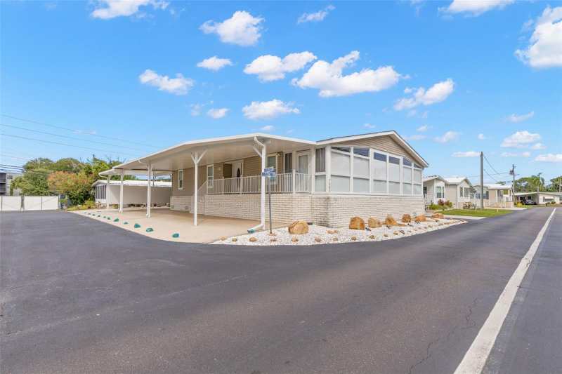 2 bedroom Manufactured Home at 7300 Americana Drive #143, Mobel Americana Mobile Home Park Unrec, St Petersburg — photo 1