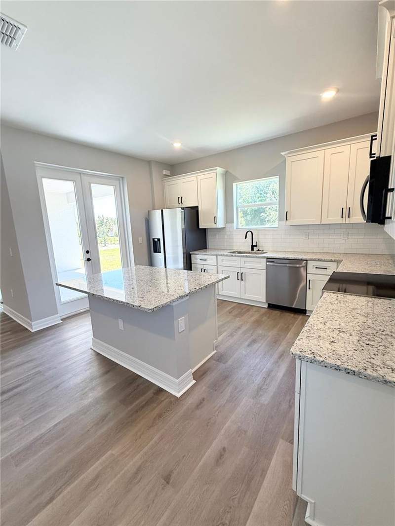 4 bedroom Single Family Residence at 13409 Gainesville Avenue, Port Charlotte Sec 085, Port Charlotte — photo 3