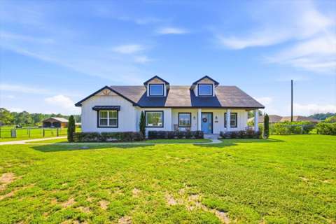 18165 Bayamon Avenue, home for sale in Polk City 33868