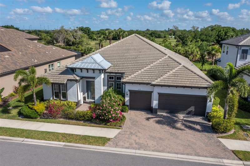 4 bedroom Single Family Residence at 6129 Lungo Lago Drive, Rivo Lakes, Sarasota — photo 1