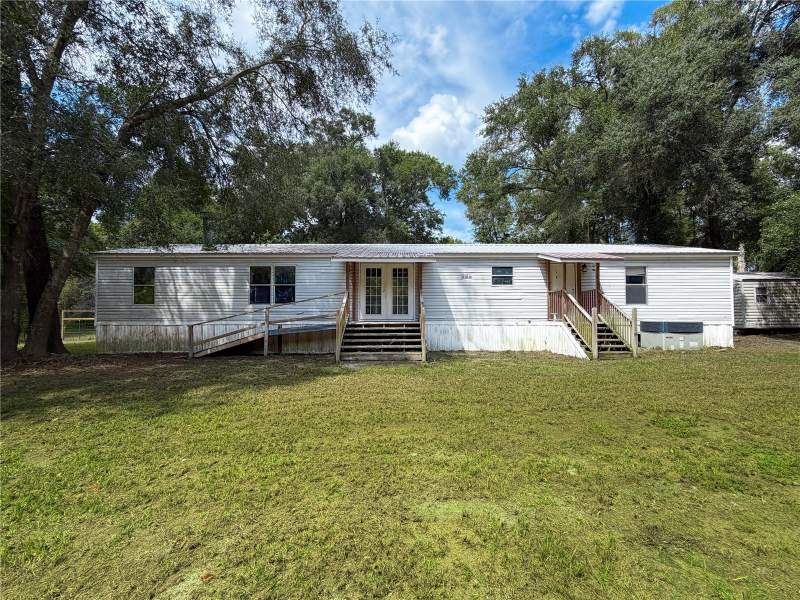 4 bedroom Manufactured Home at 19413 SW State Road 47, Sandy Acres, Fort White — photo 3