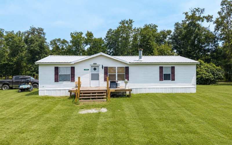 3 bedroom Manufactured Home at 12329 176th Street, Fields/Mcalpine Ph 02, Mc Alpin — photo 1