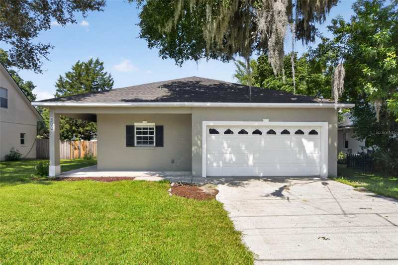 3 bedroom Single Family Residence at 300 S Woodland Street, Vinings Add Winter Garden, Winter Garden — photo 1