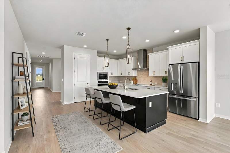 4 bedroom Single Family Residence at 5129 Chattahoochee Bend, Lakeside At Satilla, St Cloud — photo 2