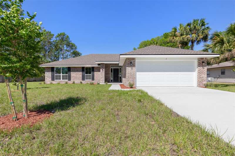 4 bedroom Single Family Residence at 105 Palmwood Drive, Southwest Quadrant Ph 01-04, Palm Coast — photo 1