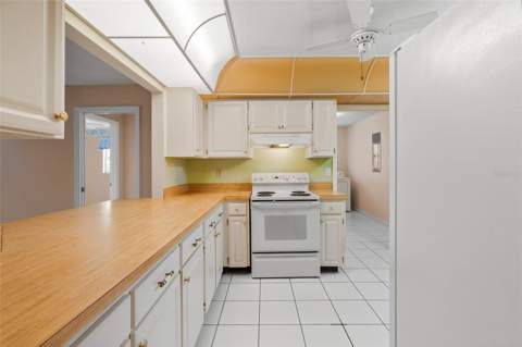 1027 Bluewater Drive, Sun City Center FL - photo 12 of 42