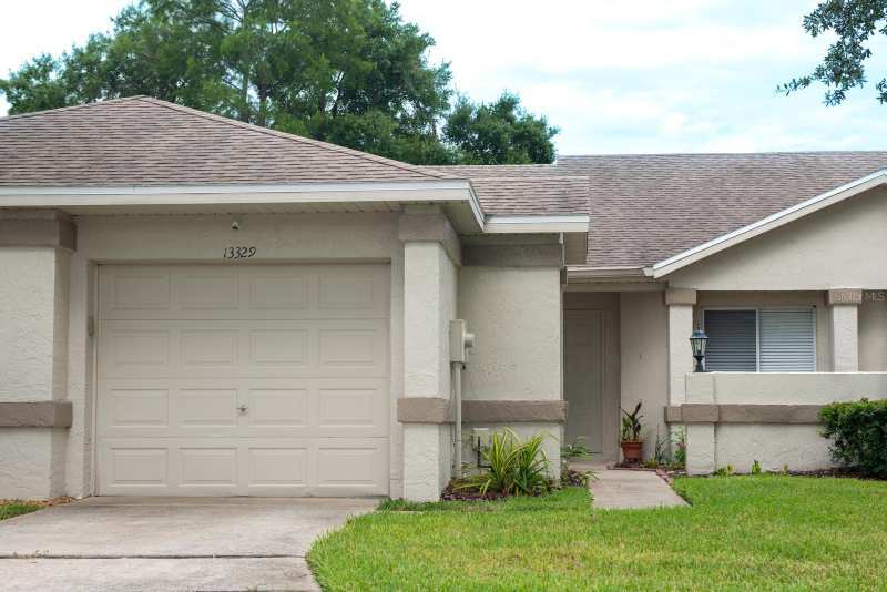 2 bedroom Villa at 13329 Laver Lane, Club Courts At Meadow Woods Ph 02, Orlando — photo 1