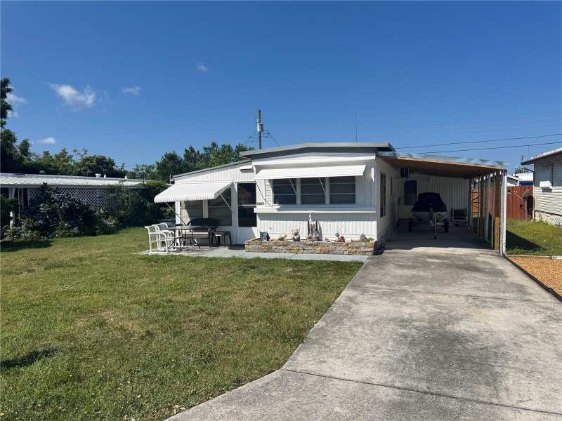 2 bedroom Mobile Home at 1837 Lullaby Drive, Buena Vista Second Add, Holiday — photo 1