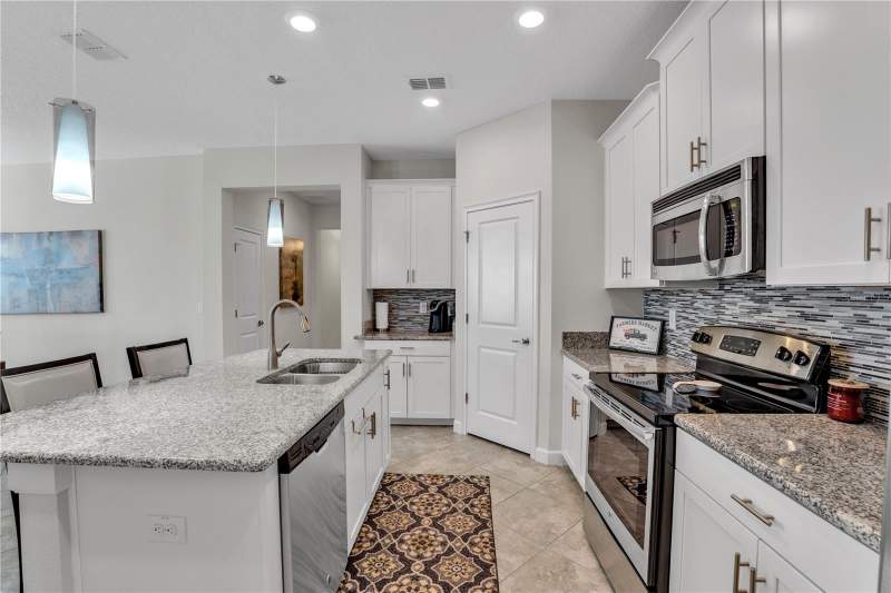 4 bedroom Single Family Residence at 1419 Pro Shop Ct, Stoneybrook South Ph F-1, Davenport — photo 5