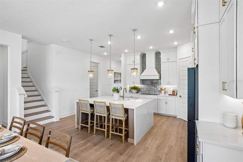 5 bedroom Single Family Residence at 17428 Honeybell Tangelo Court, Northlake At Ovation, Winter Garden — photo 3