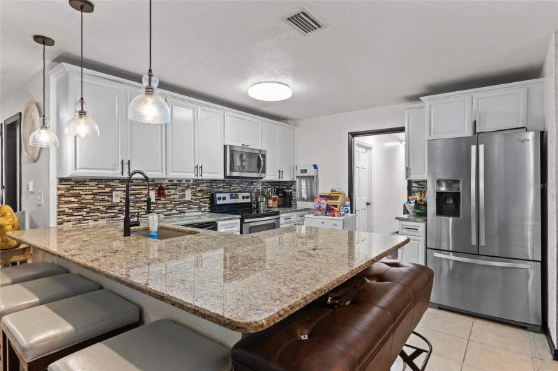 4 bedroom Single Family Residence at 1319 Quintuplet Drive, Sportsmans Paradise Rep Of A Pt Of, Casselberry — photo 4