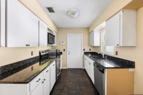7221 Northbridge Boulevard, Tampa FL - photo 10 of 35