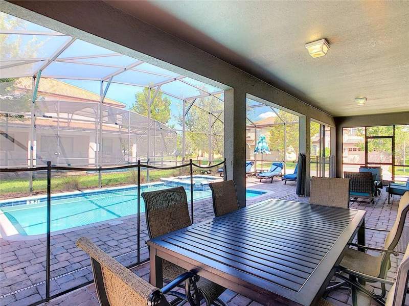 7 bedroom Single Family Residence at 9101 El Caro Lane, Stoneybrook South Ph 1, Davenport — photo 5