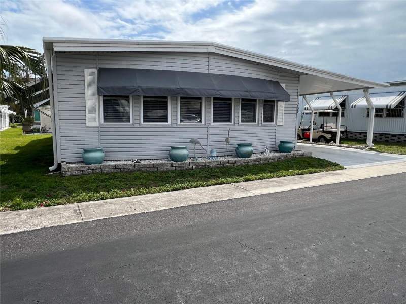 2 bedroom Manufactured Home at 709 SUGAR PALM STREET, PALM HILL MOBILE HOME PARK UNREC, LARGO — photo 1