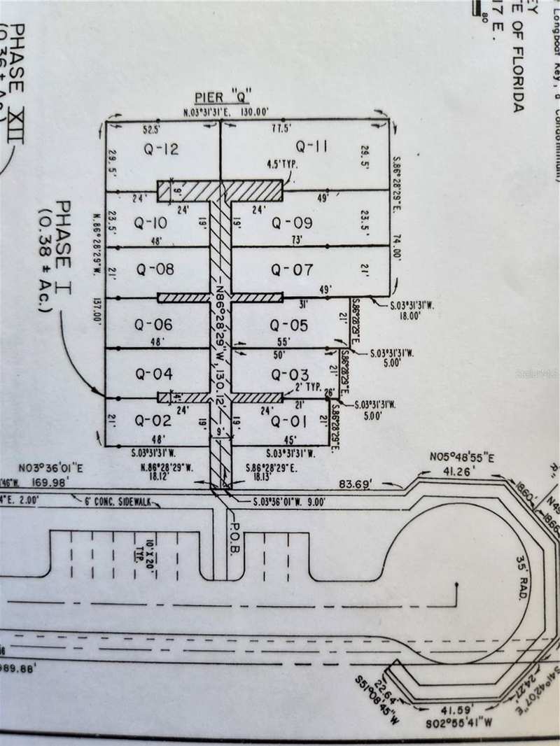 bedroom Dock-Rackominium at 2600 Harbourside Drive #Q-08, Longboat Key Moorings Marina, Longboat Key — photo 1