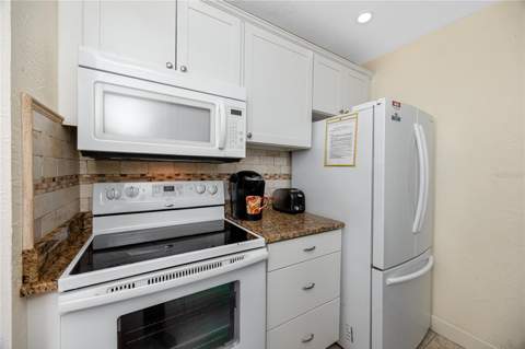 159 Medallion Boulevard #F, Madeira Beach FL - photo 19 of 47