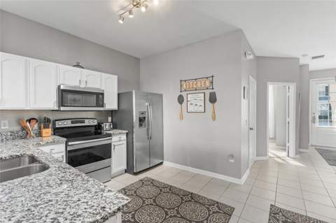 7681 Sir Kaufmann Court, Kissimmee FL - photo 7 of 38