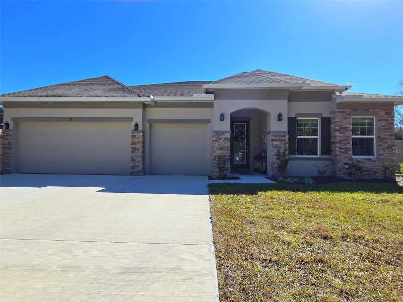 4 bedroom Single Family Residence at 2 Pat Place, Southwest Quadrant Ph 01-04, Palm Coast — photo 1