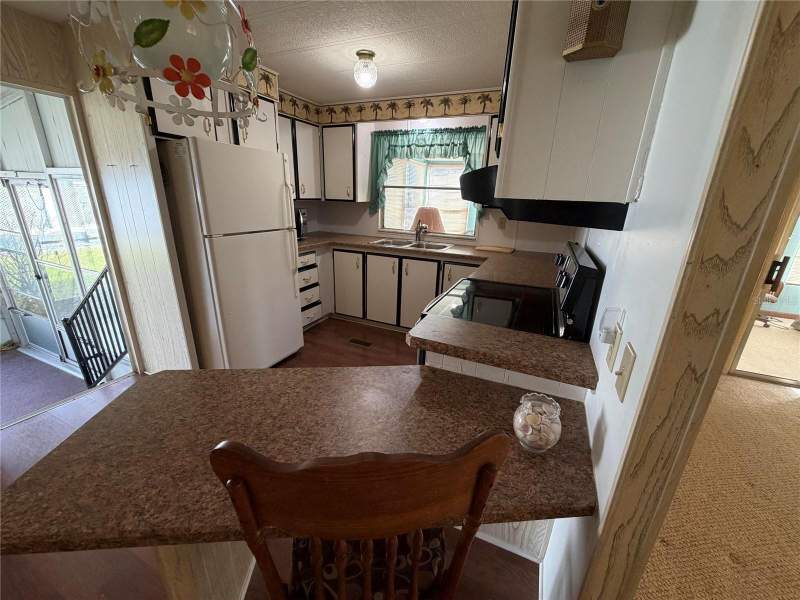 2 bedroom Manufactured Home at 930 Tarrson Boulevard, Orange Blossom Gardens Unit 03, Lady Lake — photo 4