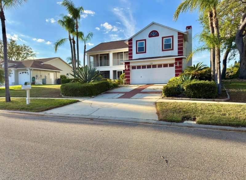 4 bedroom Single Family Residence at 1702 Sunkissed Drive, Sun Kissed Heights, Tarpon Springs — photo 1