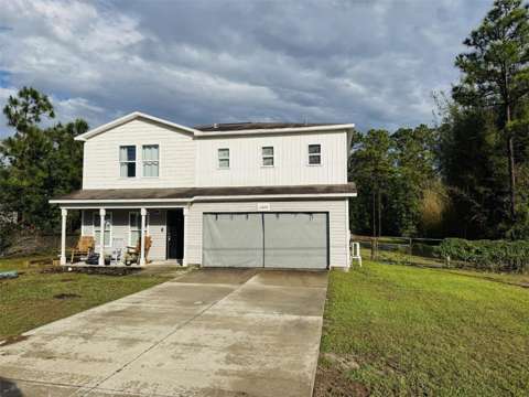 12020 Pine Warbler Avenue, $300k–$500k for sale in Weeki Wachee