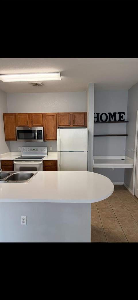 8103 Lillies Way #108, Orlando FL - photo 11 of 34