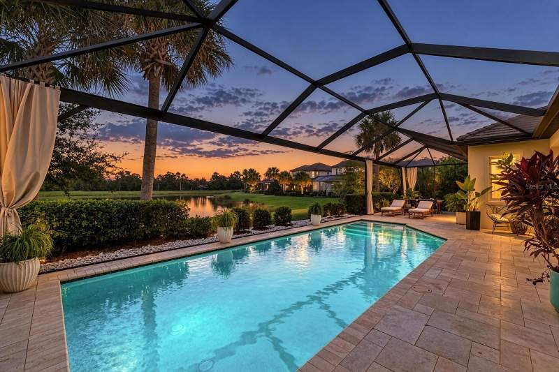 4 bedroom Single Family Residence at 6185 Lungo Lago Drive, Rivo Lakes, Sarasota — photo 2