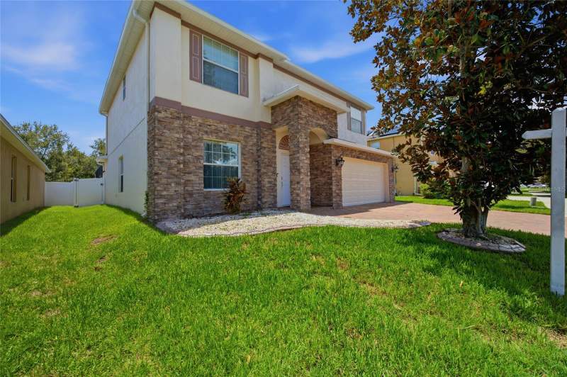 4 bedroom Single Family Residence at 12407 Gilmerton Mist Lane, Worthington Lot 20, Riverview — photo 2