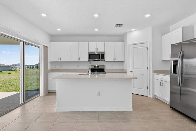 4 bedroom Single Family Residence at 217 Streamwater Way, Waterstone, Groveland — photo 2