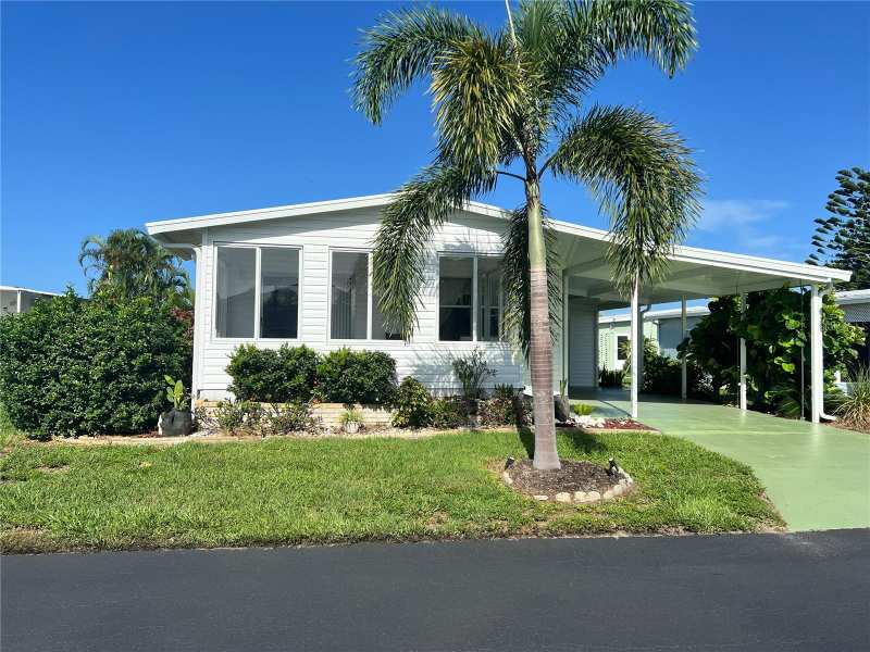 2 bedroom Manufactured Home at 7 S Esplanade Street, Alameda Isles, Englewood — photo 1