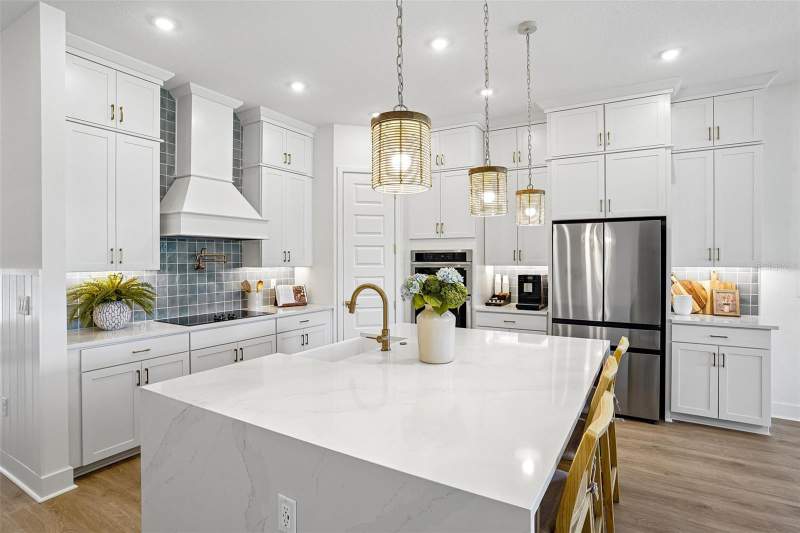 5 bedroom Single Family Residence at 17428 Honeybell Tangelo Court, Northlake At Ovation, Winter Garden — photo 2