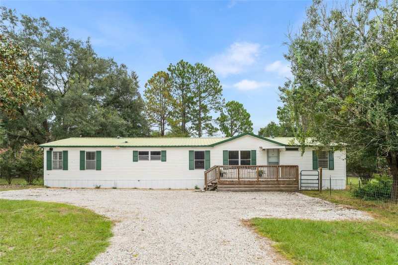 4 bedroom Manufactured Home at 13519 SW 89th Terrace, Rolling K, Archer — photo 1