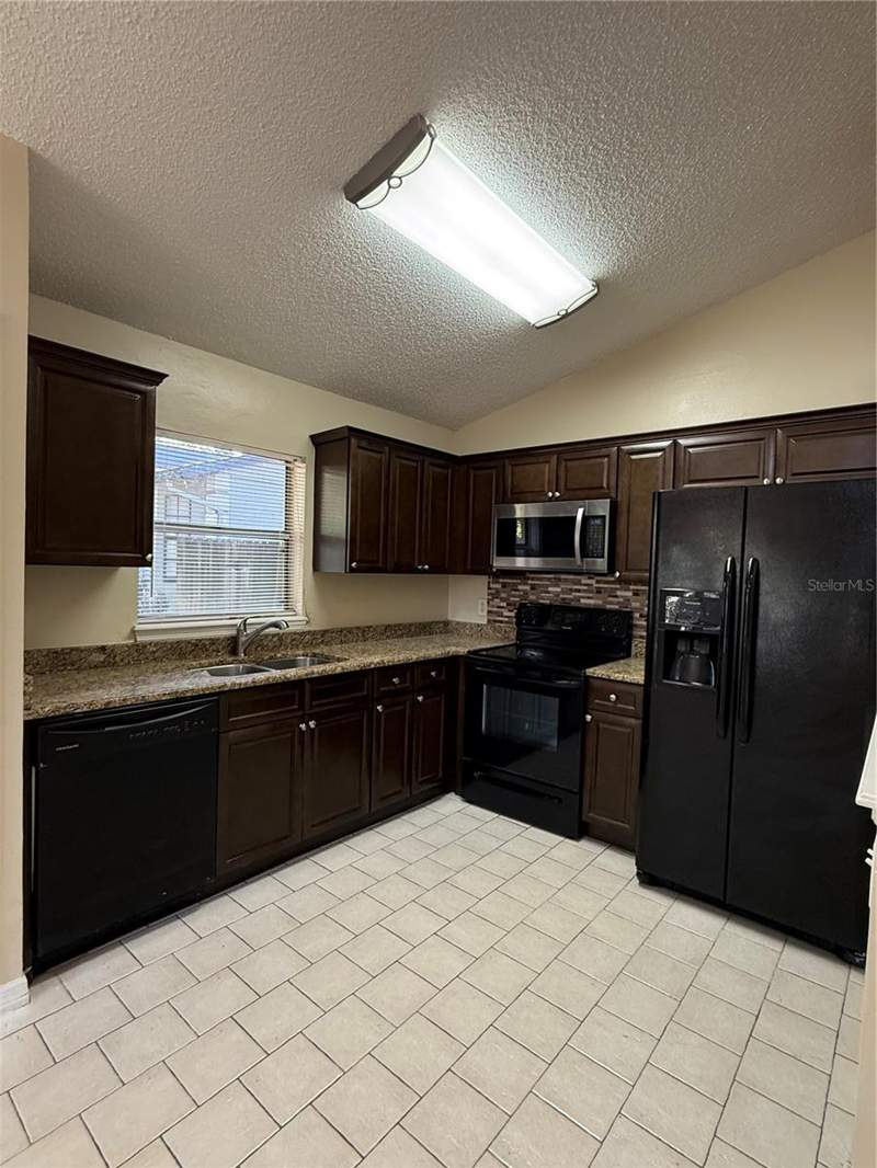 2 bedroom Half Duplex at 776 WOLF CREEK COURT, CIMARRON HILLS, APOPKA — photo 3