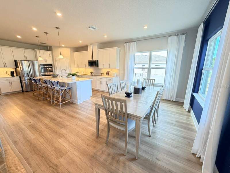 5 bedroom Single Family Residence at 1234 WHISPERING LANE, OVERLOOK AT GRASSY LAKE EAST PHASE 3, MINNEOLA — photo 5