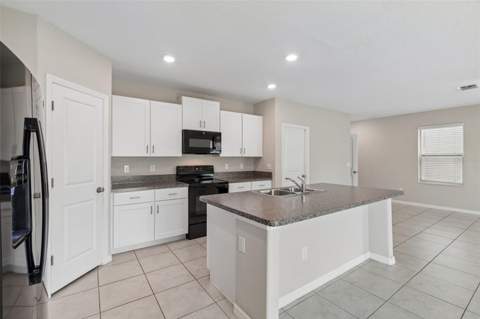 3715 Daisy Bloom Place, Tampa FL - photo 13 of 81