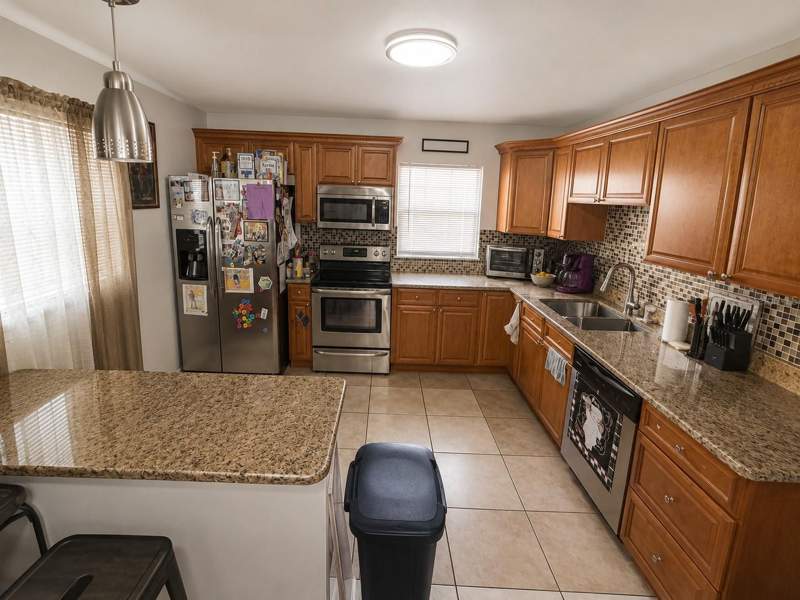 4 bedroom Single Family Residence at 7507 W Caracas Street, Holliday Village Sec 1, Tampa — photo 3