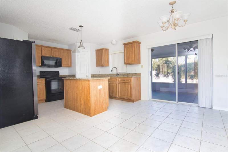 4 bedroom Single Family Residence at 15907 Wilkinson Drive, Westchester Ph 6 & 7, Clermont — photo 3