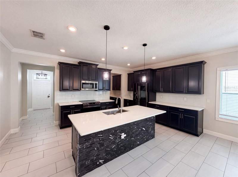6 bedroom Single Family Residence at 1423 Pro Shop Court, Stoneybrook South Ph F-1, Davenport — photo 2