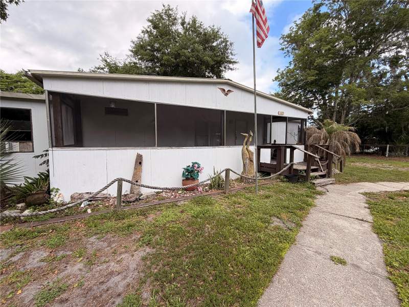 3 bedroom Manufactured Home at 24021 Armadillo Road, Astor Forest Campsites Unrec, Astor — photo 2