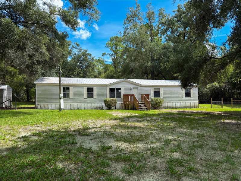 4 bedroom Manufactured Home at 19413 SW State Road 47, Sandy Acres, Fort White — photo 1