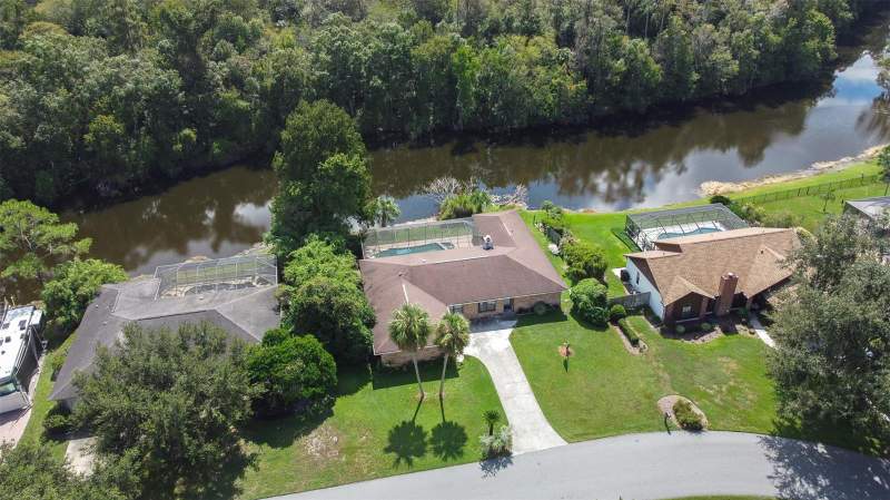 4 bedroom Single Family Residence at 23414 Cherbourg Loop, Lake Padgett Estates, Land O Lakes — photo 2