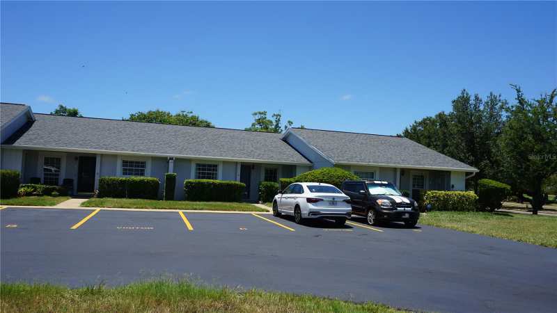 2 bedroom Condominium at 12543 Dearborn Drive, Village Woods Condo Ph 03, Hudson — photo 1