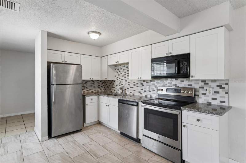 4 bedroom Single Family Residence at 9608 N 10th Street, Castle Heights Map, Tampa — photo 4