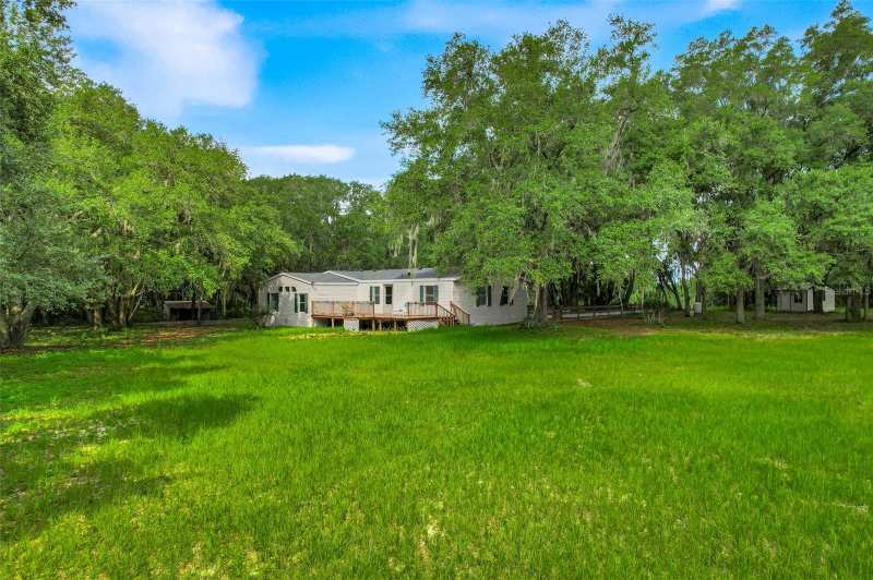 4 bedroom Manufactured Home at 23449 Thomas Allen Road, Acreage, Howey In The Hills — photo 1